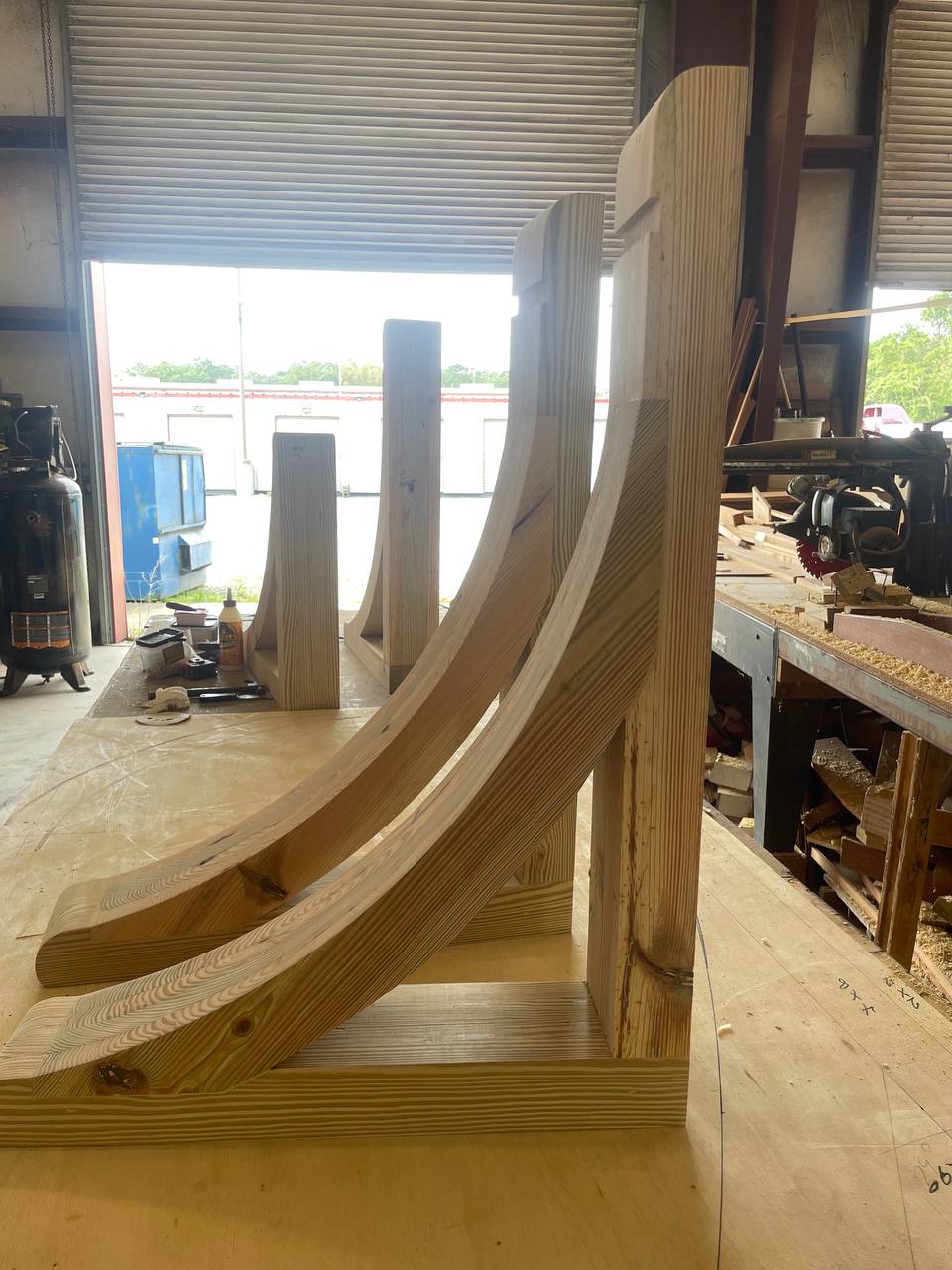 Large curved Sapele corbel brackets taking shape in the shop