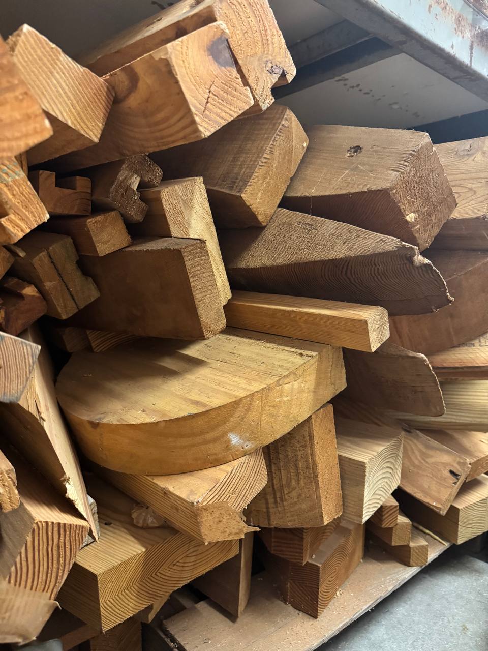 Raw hardwood boards in the J&P Woodcrafters shop near Charleston, South Carolina, ready to be cut and finished